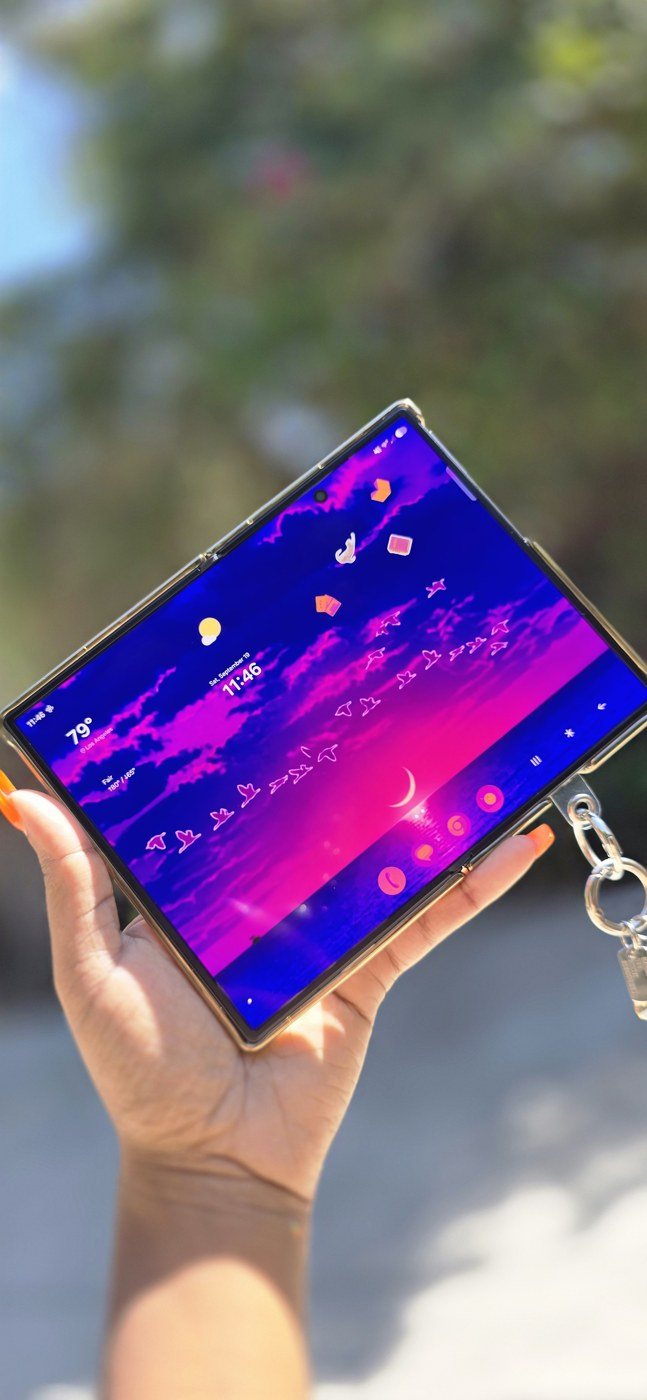 Open Galaxy Z Fold with a night-sky wallpaper