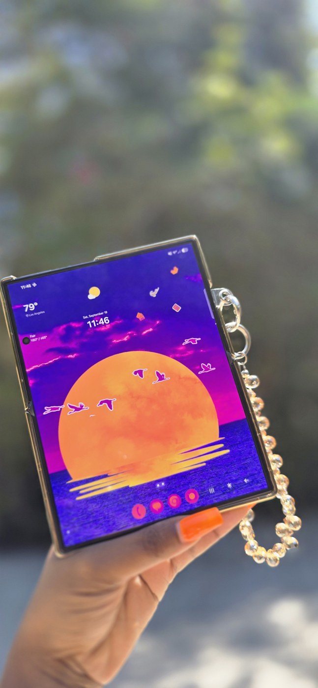 Galaxy Z Fold with a sunset lock screen
